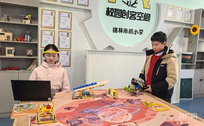 专注力“隔空取物”呼和浩特两名小学生问鼎世界机器人大赛冠军(图2)